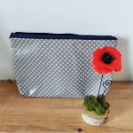 Trousse de toilette grise  avec des étoiles blanches